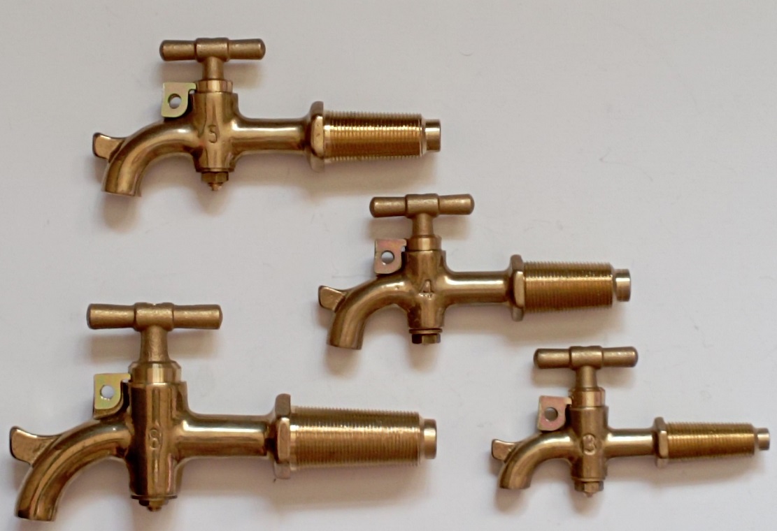 Brass taps in brass for large oak barrels